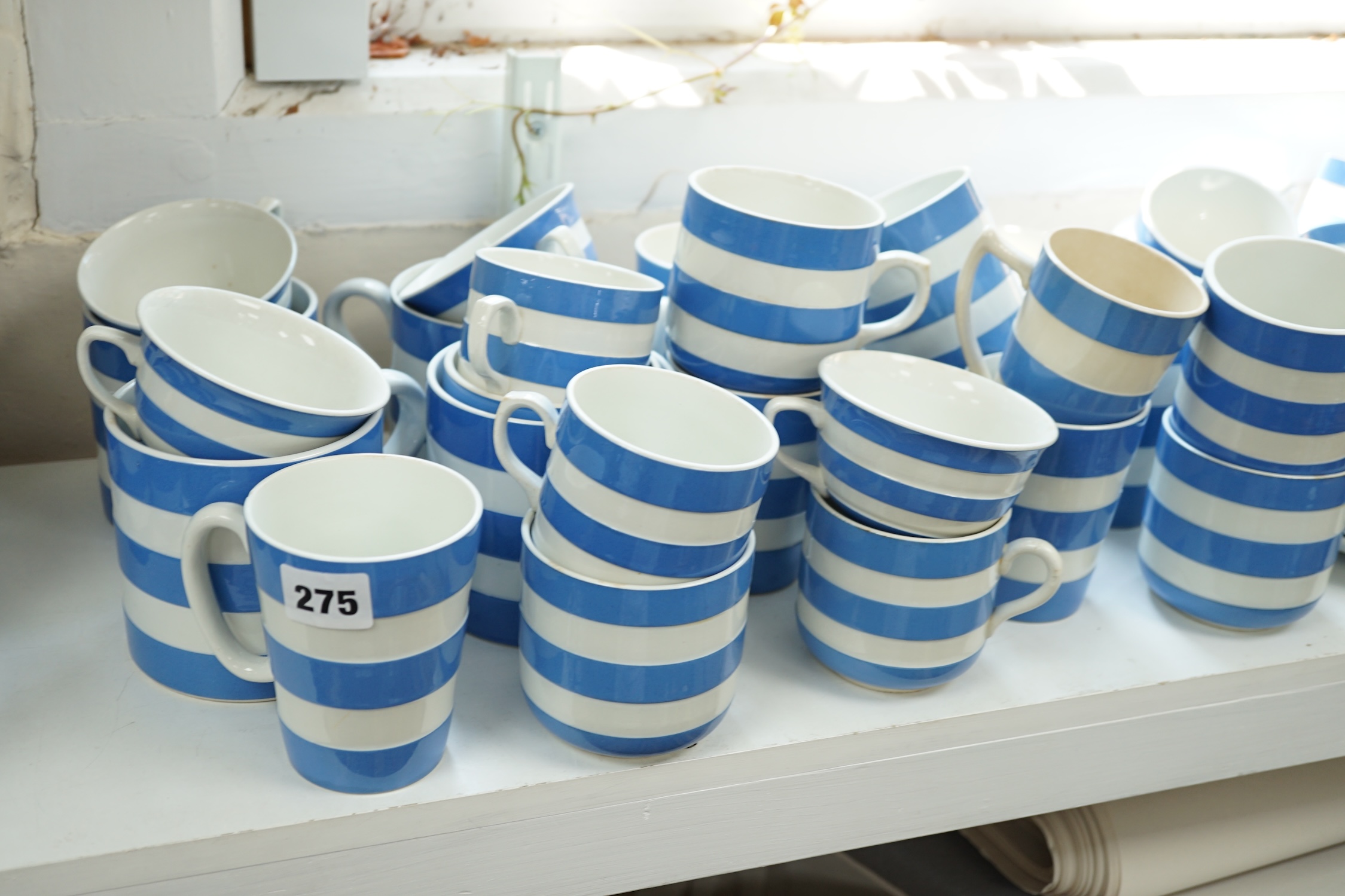 T.G.Green Cornish Kitchenware, a collection of assorted tea and coffee cups, saucers and beakers, approximately sixty pieces, Green Shield marks. Condition - poor, fair and good